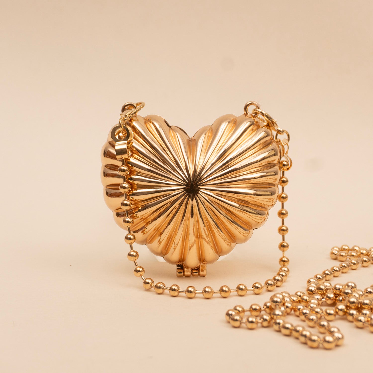 Radiant Heart Mini Clutch